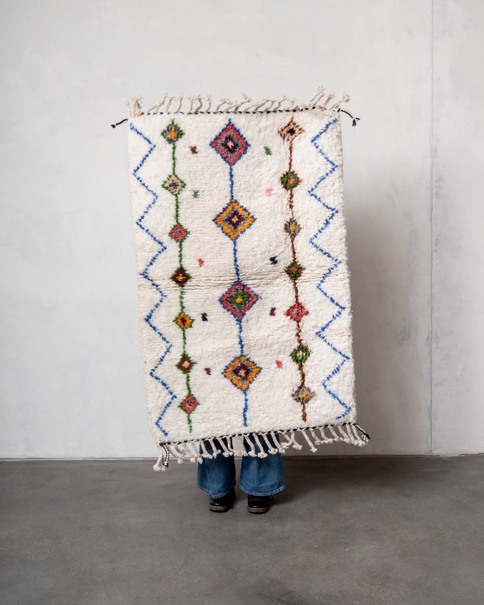 Modern, designer, handcrafted Berber rug from Morocco. Beniourain carpet with beautiful colours and patterns and fluffy wool texture.